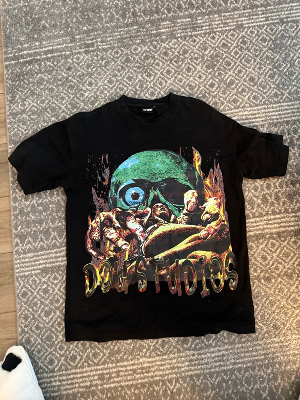 DOU STUDIOS Black Graphic Tee with Neon Skull and Claw Artwork